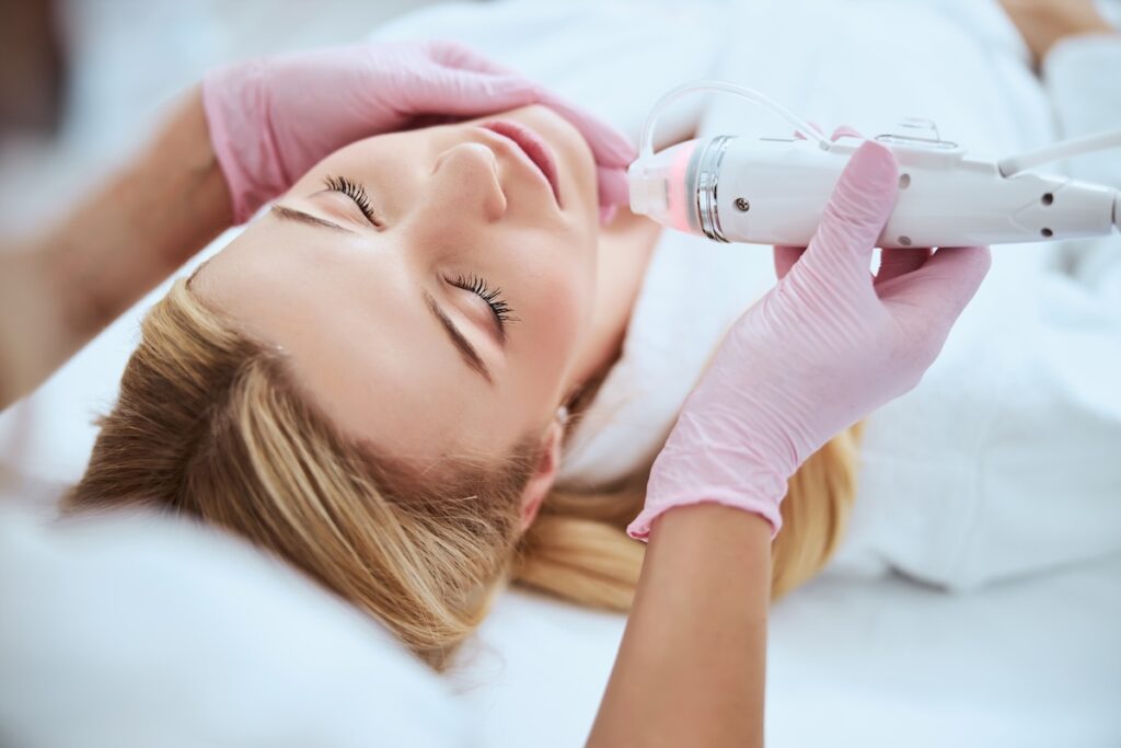 Serene,Woman,Being,Treated,By,A,Dermatologist,In,A,Beauty